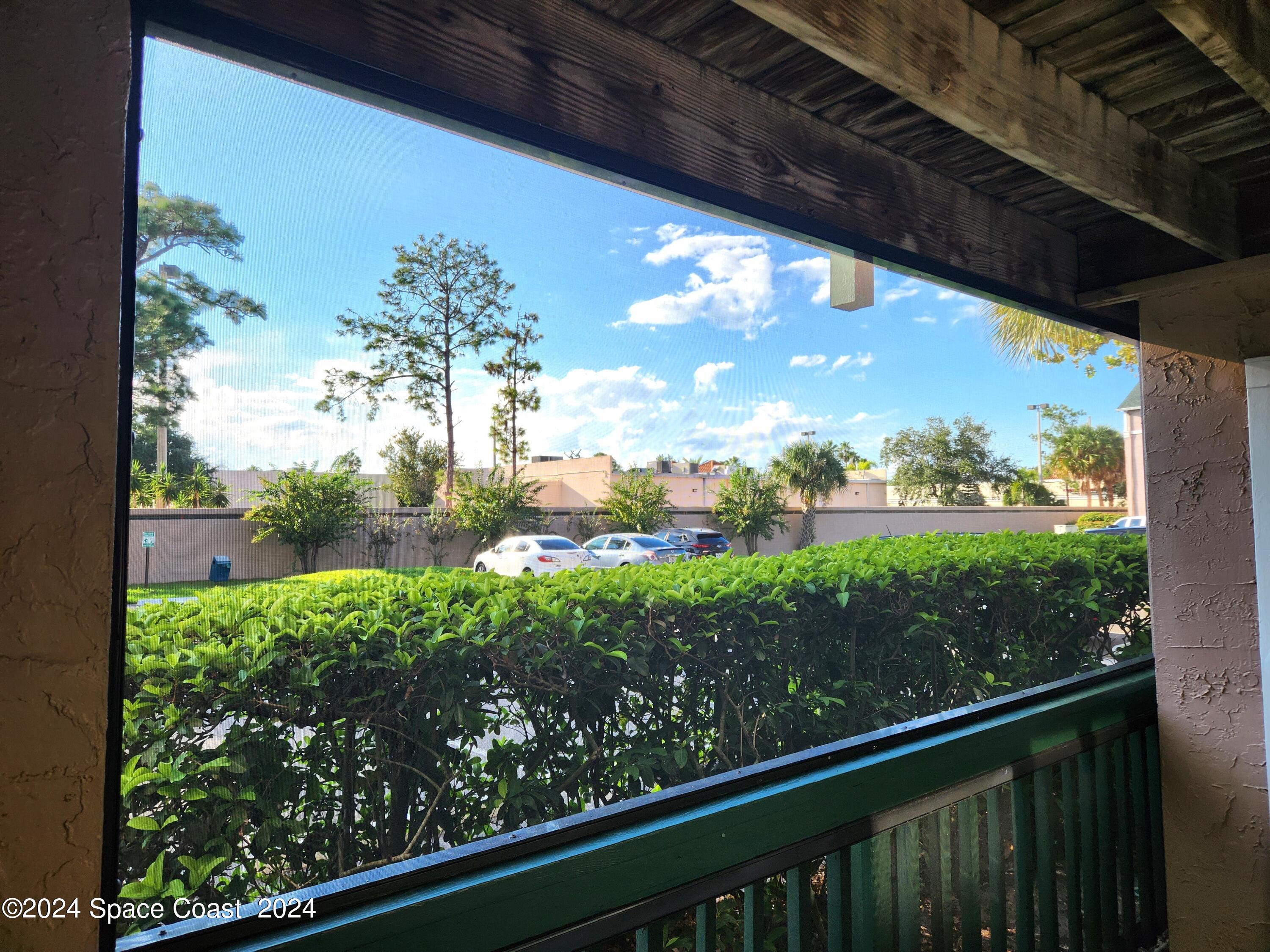 7667 North Wickham Road, Unit 601 Melbourne, FL 32940 - Photo 15 of 21 a view of a garden from a balcony