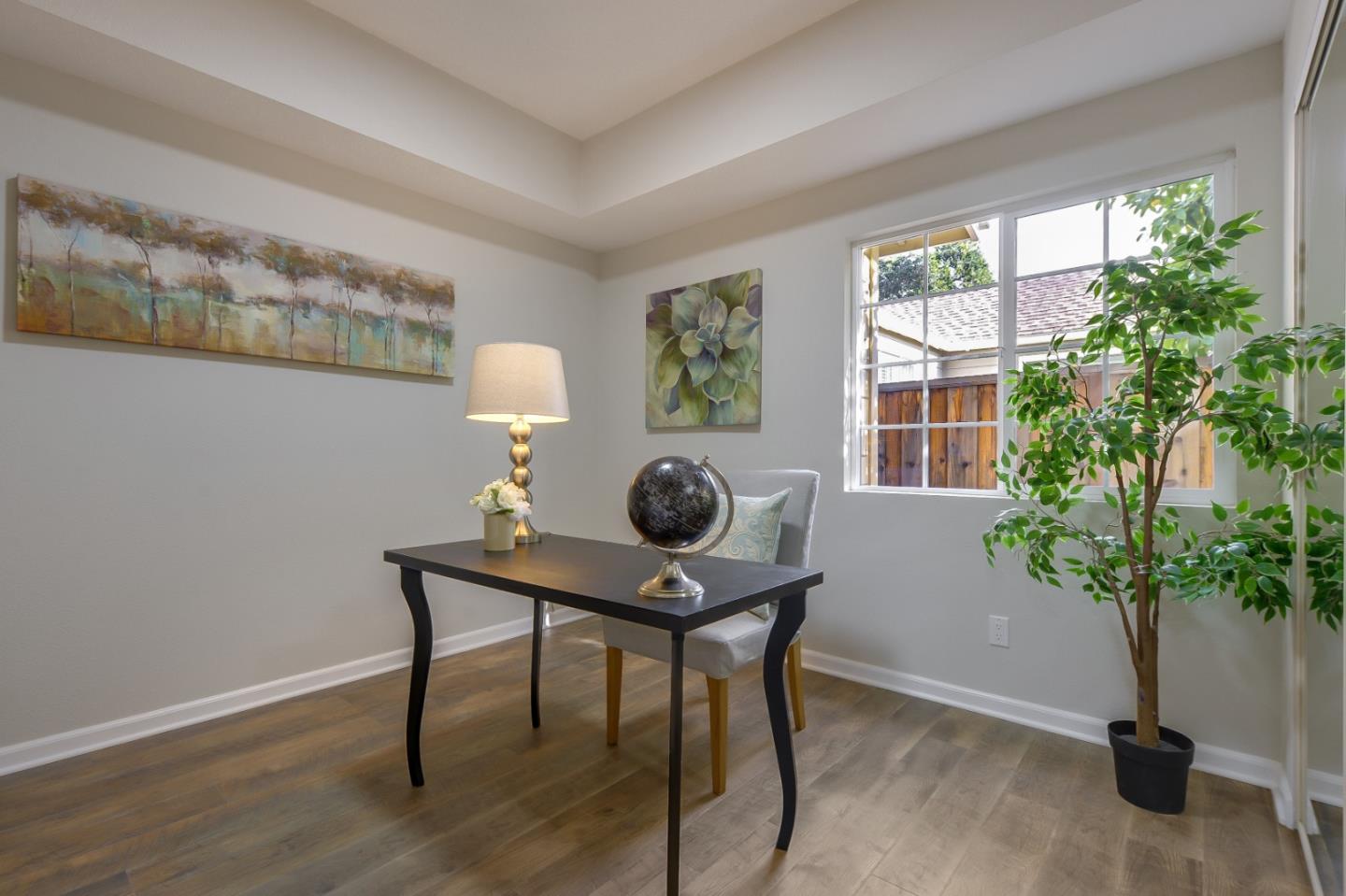 682 Willowgate Street Mountain View, CA 94043 - Photo 14 of 30 a living room with furniture potted plant and a window