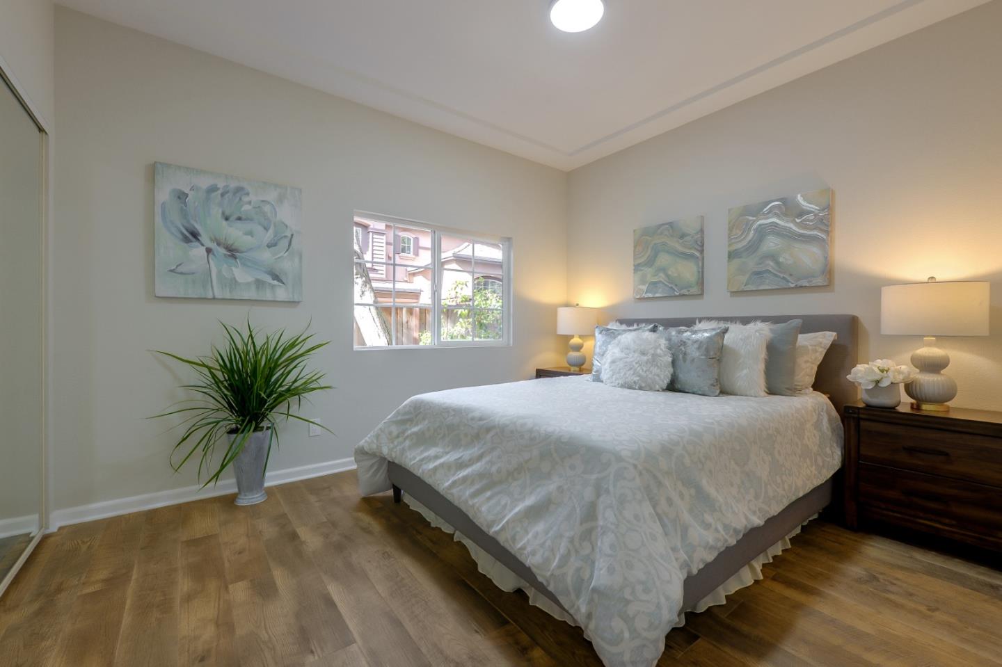 682 Willowgate Street Mountain View, CA 94043 - Photo 16 of 30 a bedroom with a bed and window