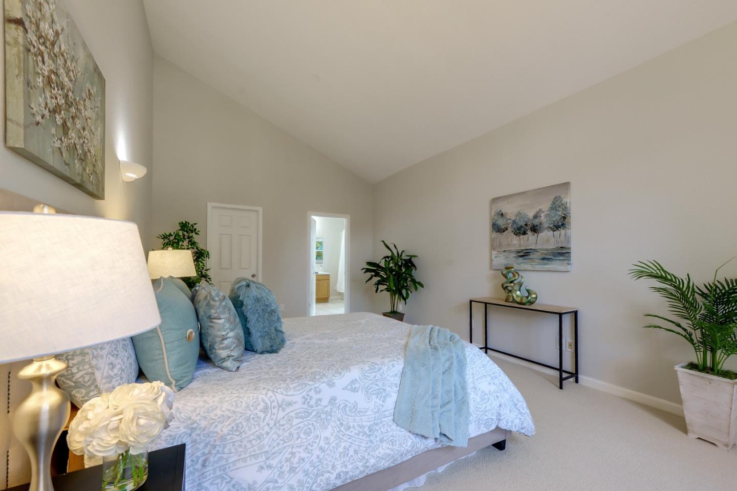 682 Willowgate Street Mountain View, CA 94043 - Photo 20 of 30 a bed room with furniture and a potted plant