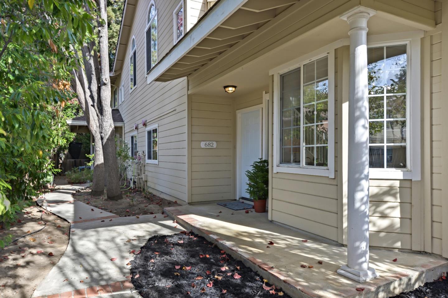 682 Willowgate Street Mountain View, CA 94043 - Photo 2 of 30 a view of a house with a yard