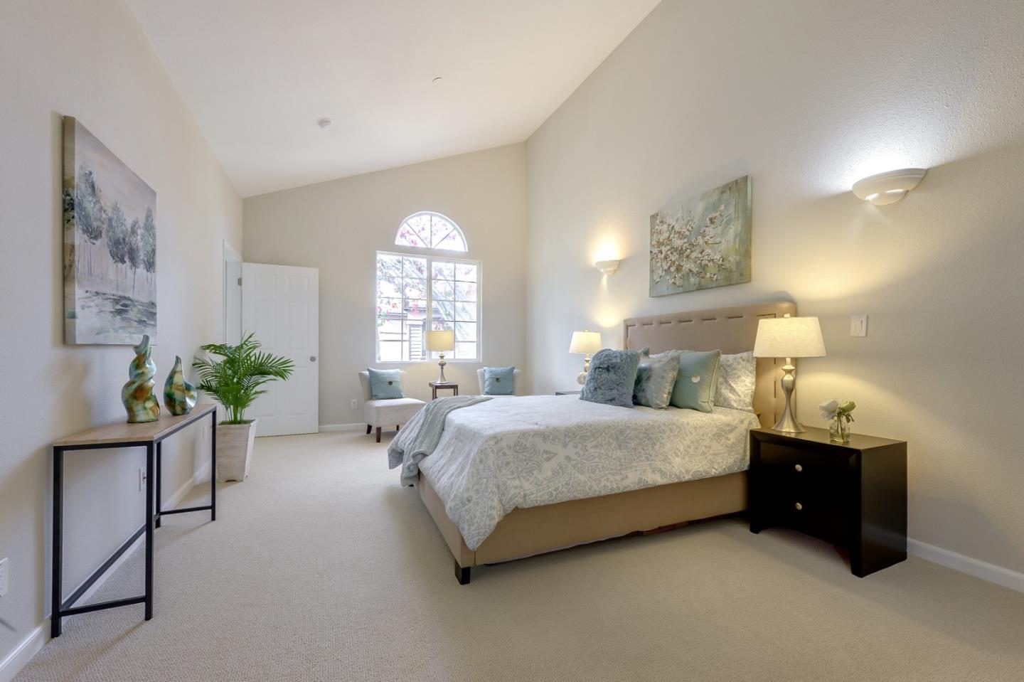 682 Willowgate Street Mountain View, CA 94043 - Photo 21 of 30 a spacious bedroom with a bed and a window