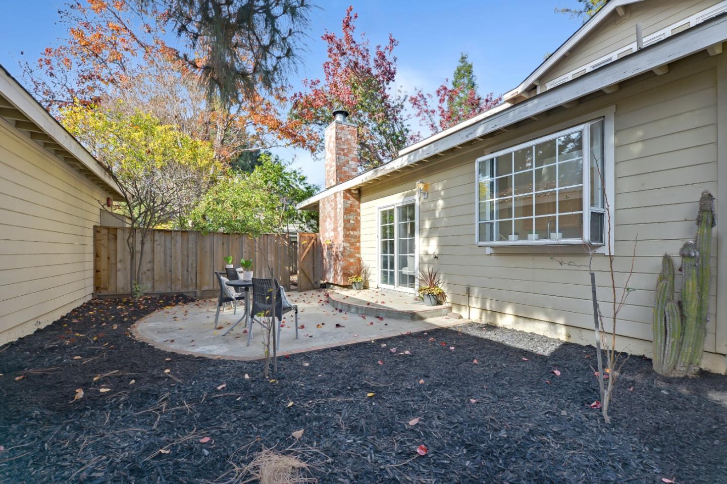 682 Willowgate Street Mountain View, CA 94043 - Photo 27 of 30 a view of a house with backyard and sitting area