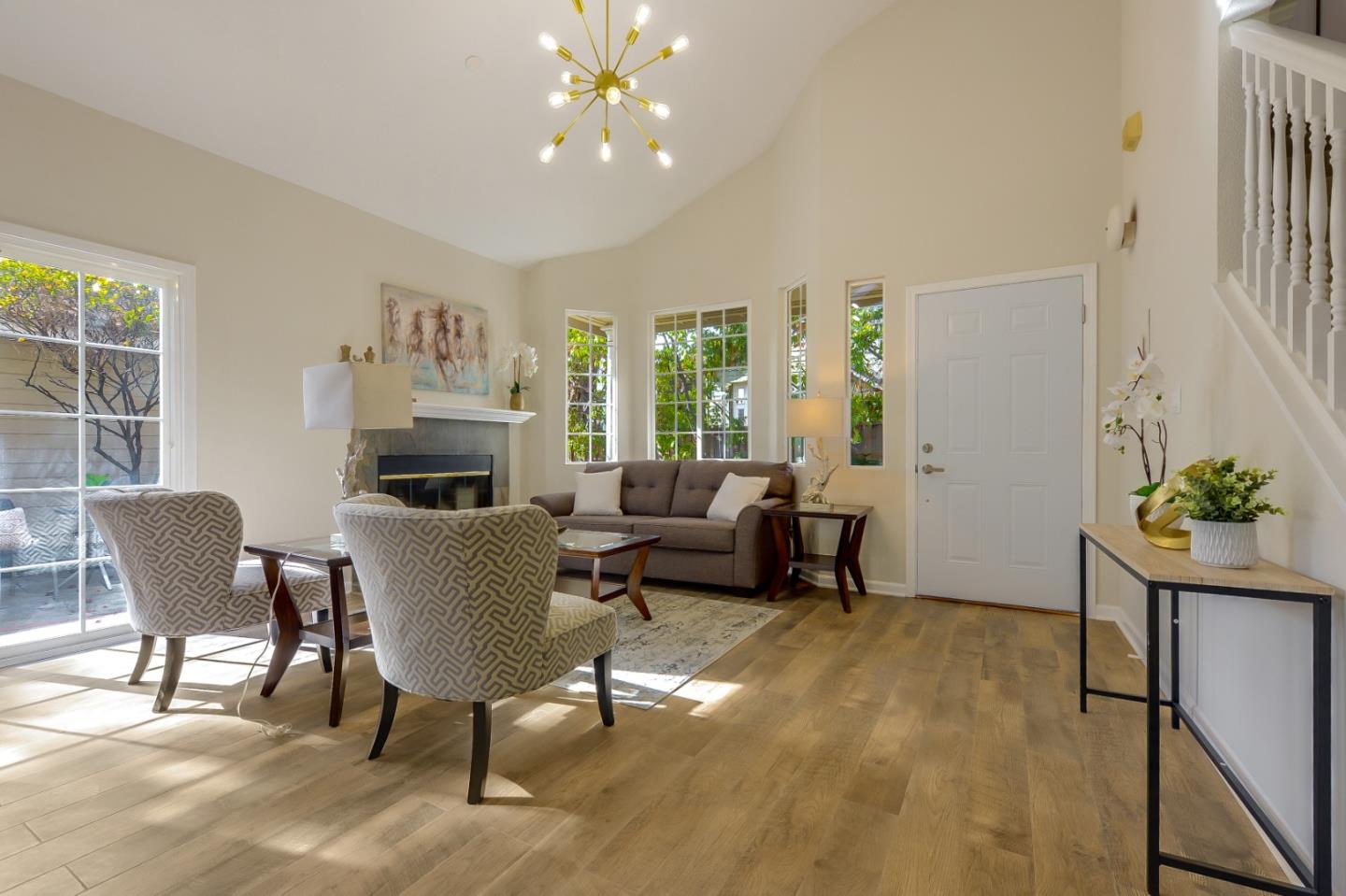 682 Willowgate Street Mountain View, CA 94043 - Photo 5 of 30 a living room with furniture and a potted plant