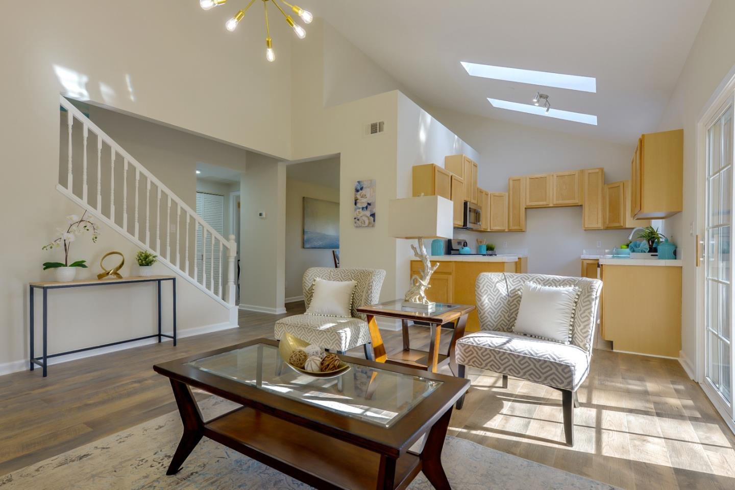 682 Willowgate Street Mountain View, CA 94043 - Photo 7 of 30 a living room with furniture and a wooden floor