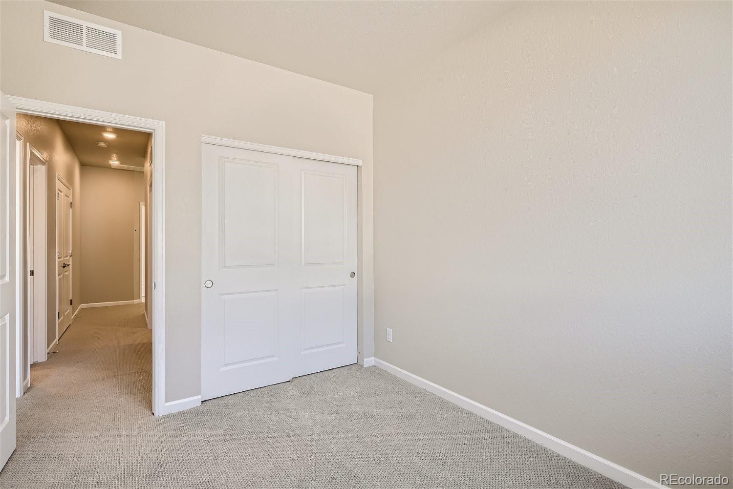 6700 Merseyside Lane Castle Pines, CO 80108 - Photo 18 of 28 a view of an empty room