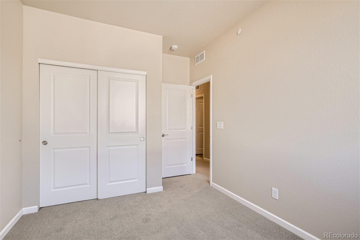 6700 Merseyside Lane Castle Pines, CO 80108 - Photo 22 of 28 a view of an empty room