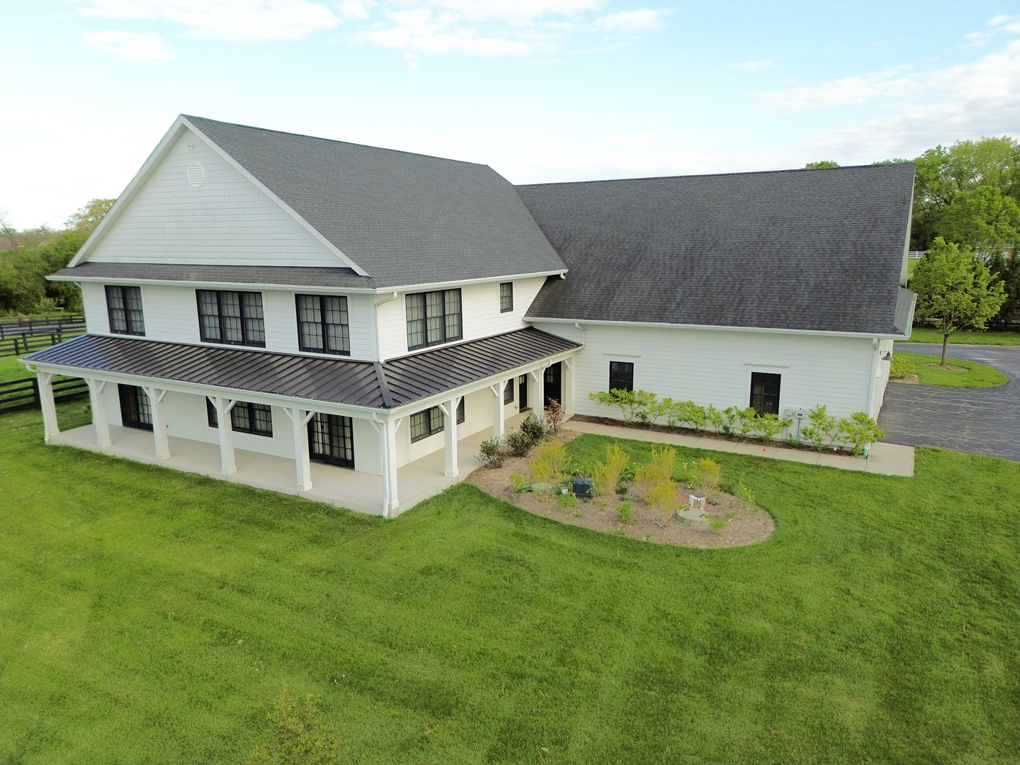 14341 West Old School Road Libertyville, IL 60048 - Photo 19 of 24 a aerial view of a house with a yard table and chairs