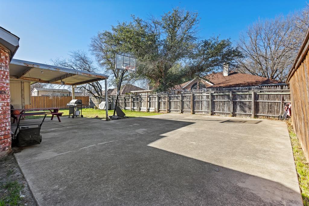 3717 Corn Valley Road Grand Prairie, TX 75052 - Photo 14 of 14 a view of a house with a yard and sitting area
