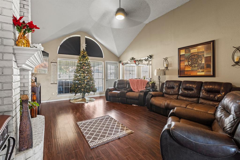 3717 Corn Valley Road Grand Prairie, TX 75052 - Photo 3 of 14 a living room with furniture and a potted plant