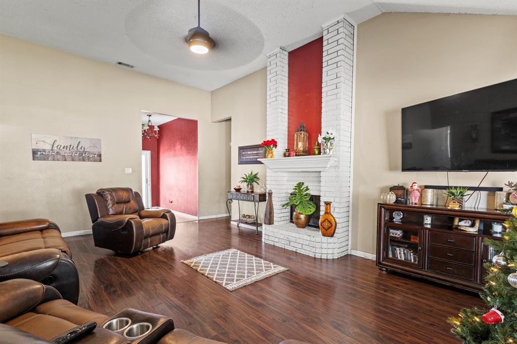 3717 Corn Valley Road Grand Prairie, TX 75052 - Photo 4 of 14 a living room with furniture and a flat screen tv