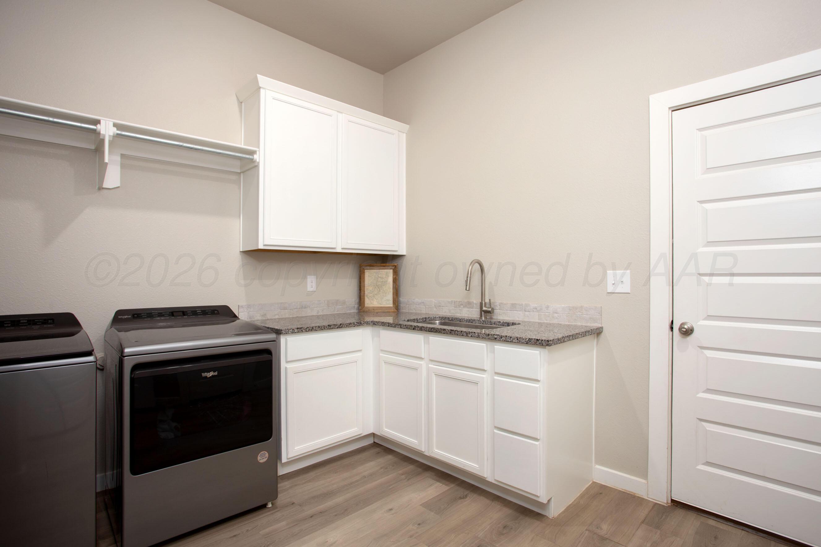 7509 Frazier Road Amarillo, TX 79119 - Photo 19 of 33 Laundry Room Sink