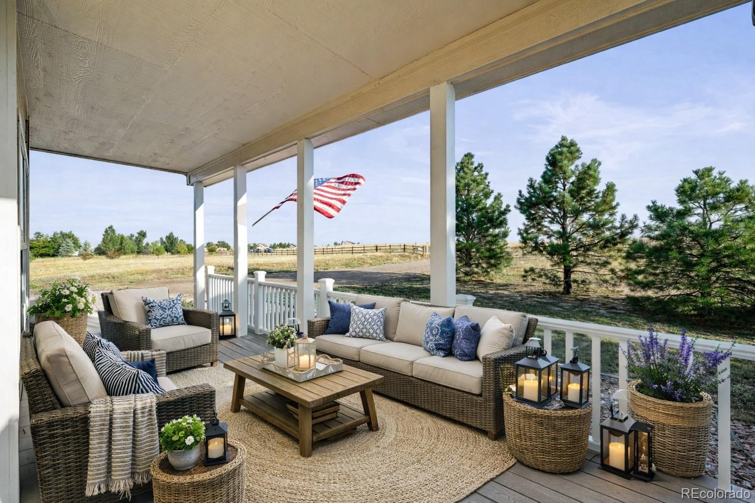 7498 Patrick Trail Elizabeth, CO 80107 - Photo 2 of 44 a outdoor living space with furniture and garden view
