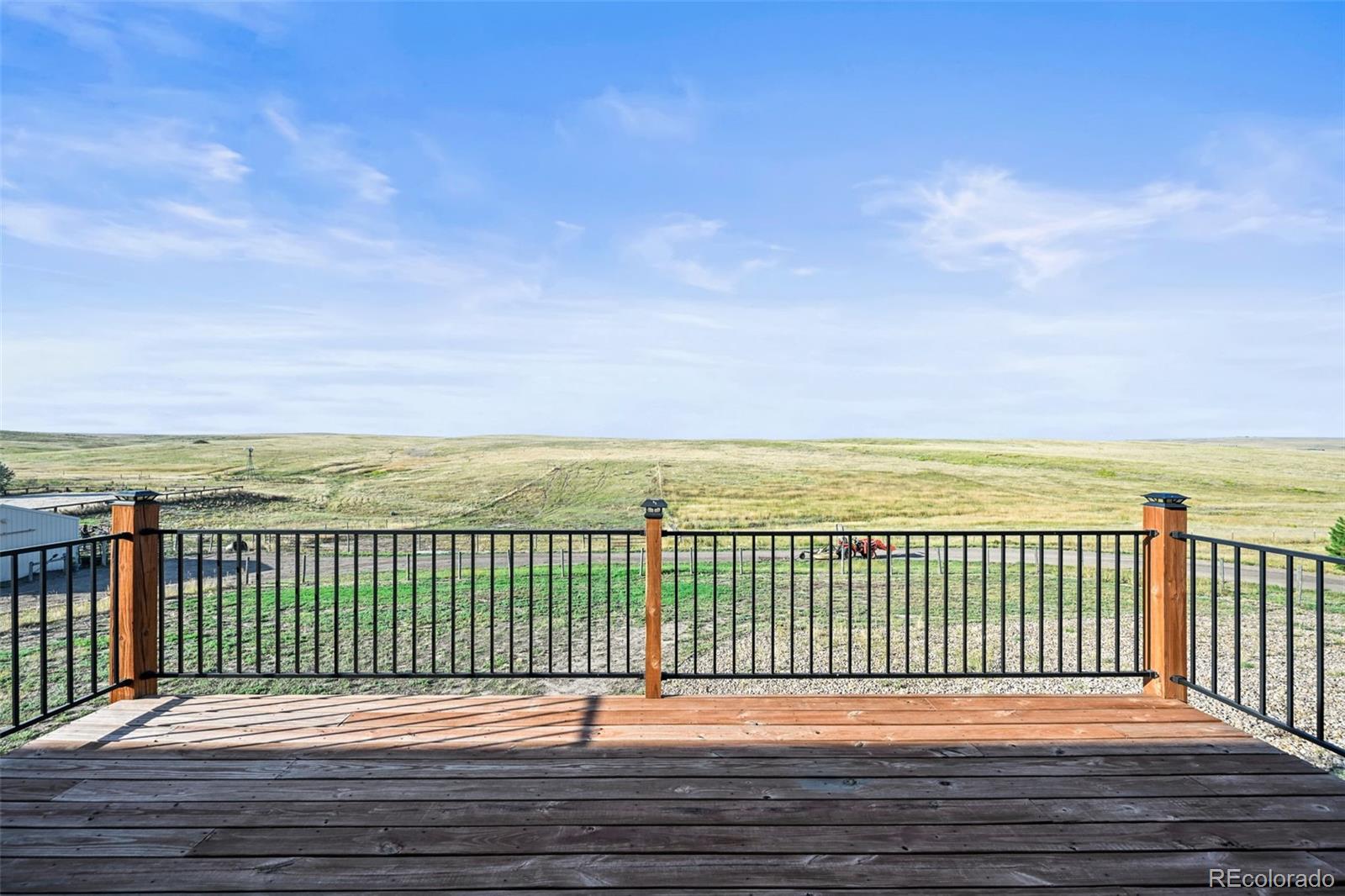 7498 Patrick Trail Elizabeth, CO 80107 - Photo 43 of 45 a view of a balcony with an ocean view