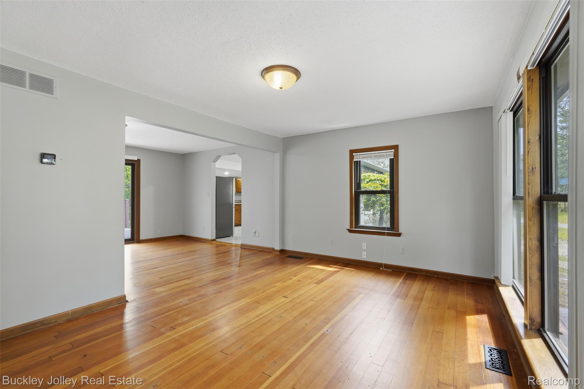 9255 Evergreen Road Brighton, MI 48116 - Photo 6 of 29 Expansive Wood Flooring