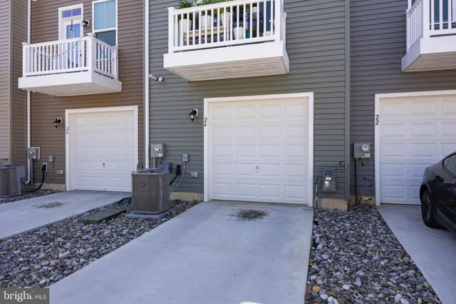 a view of a house with a barbeque