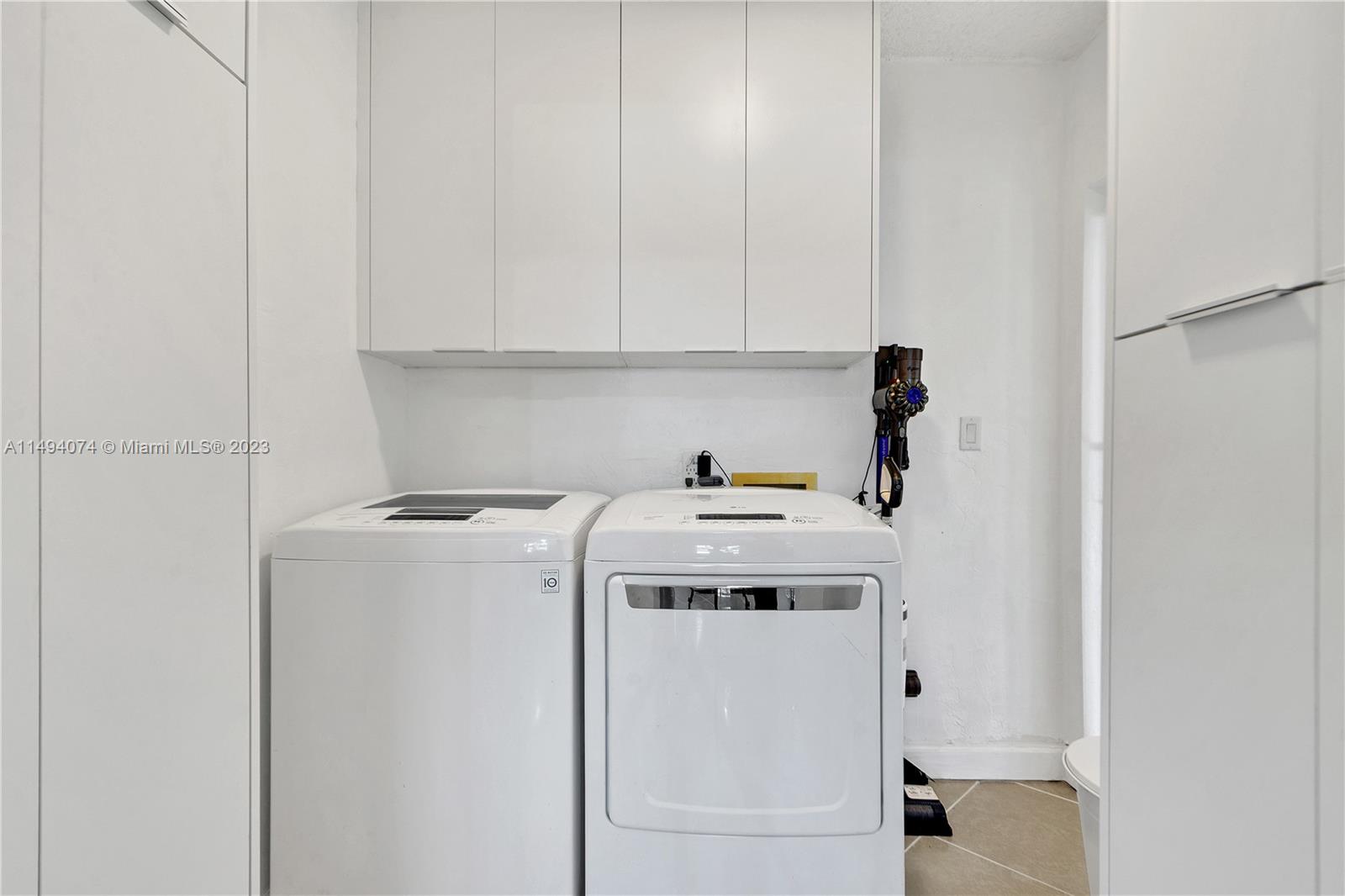 3300 Southwest 80th Avenue Miami, FL 33155 - Photo 17 of 31 a utility room with dryer and washer