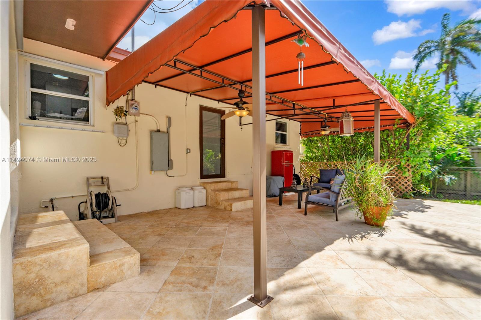 3300 Southwest 80th Avenue Miami, FL 33155 - Photo 27 of 31 a view of a house with backyard and sitting area