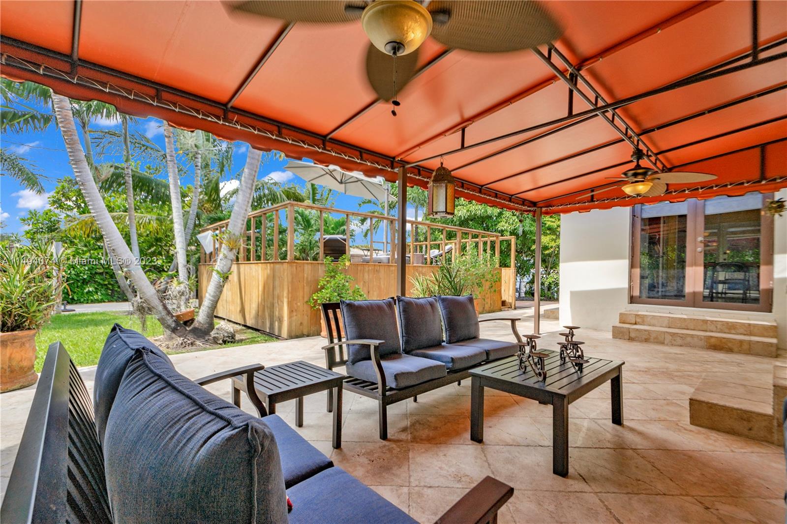 3300 Southwest 80th Avenue Miami, FL 33155 - Photo 29 of 31 a patio with patio outdoor seating and yard