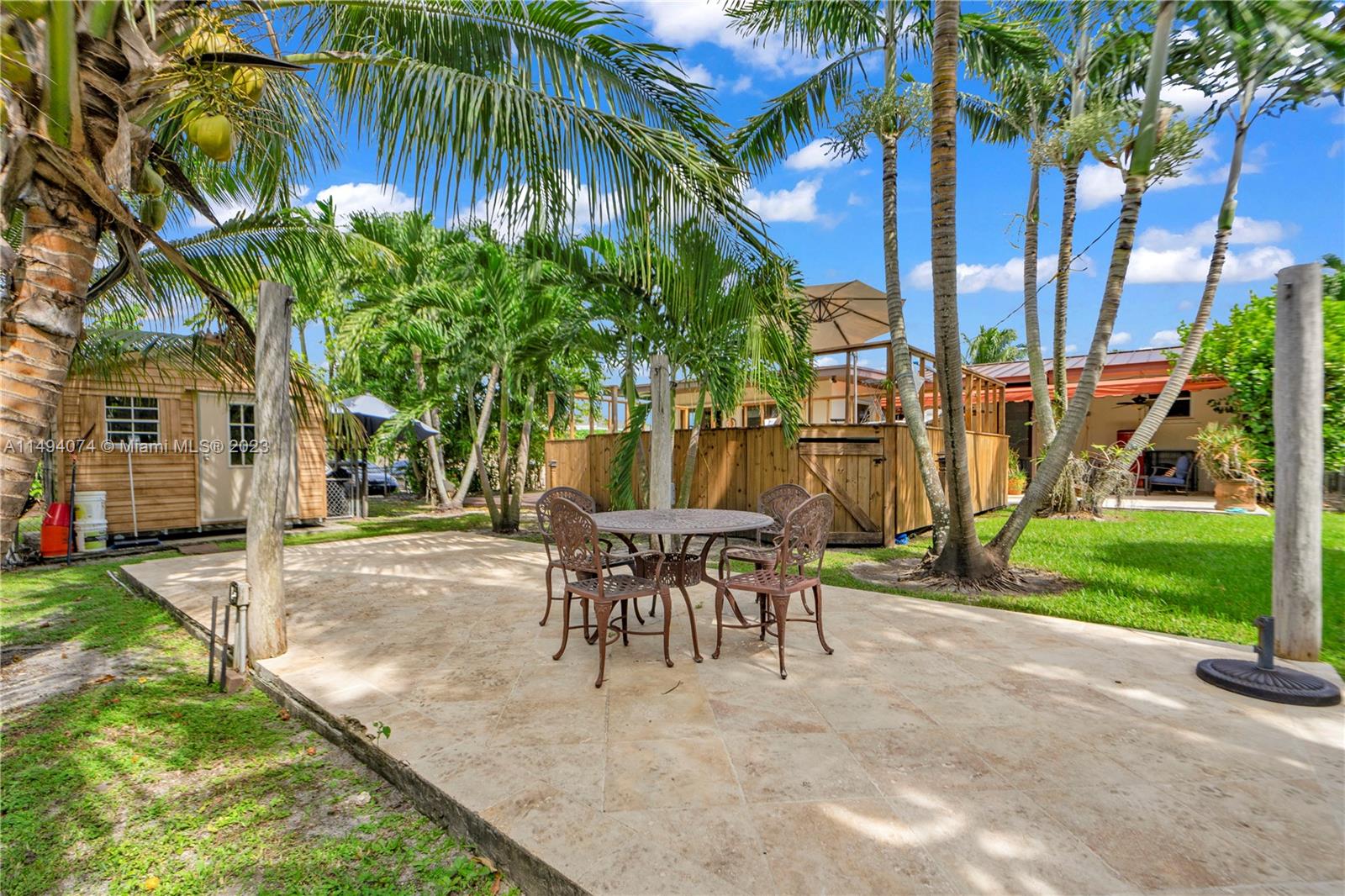 3300 Southwest 80th Avenue Miami, FL 33155 - Photo 30 of 31 a view of a backyard with a patio