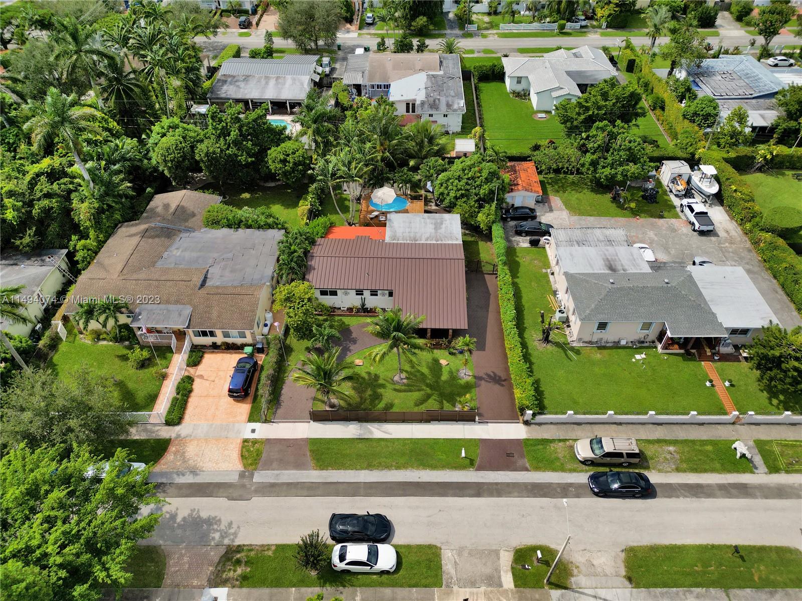3300 Southwest 80th Avenue Miami, FL 33155 - Photo 4 of 31 an aerial view of houses with yard