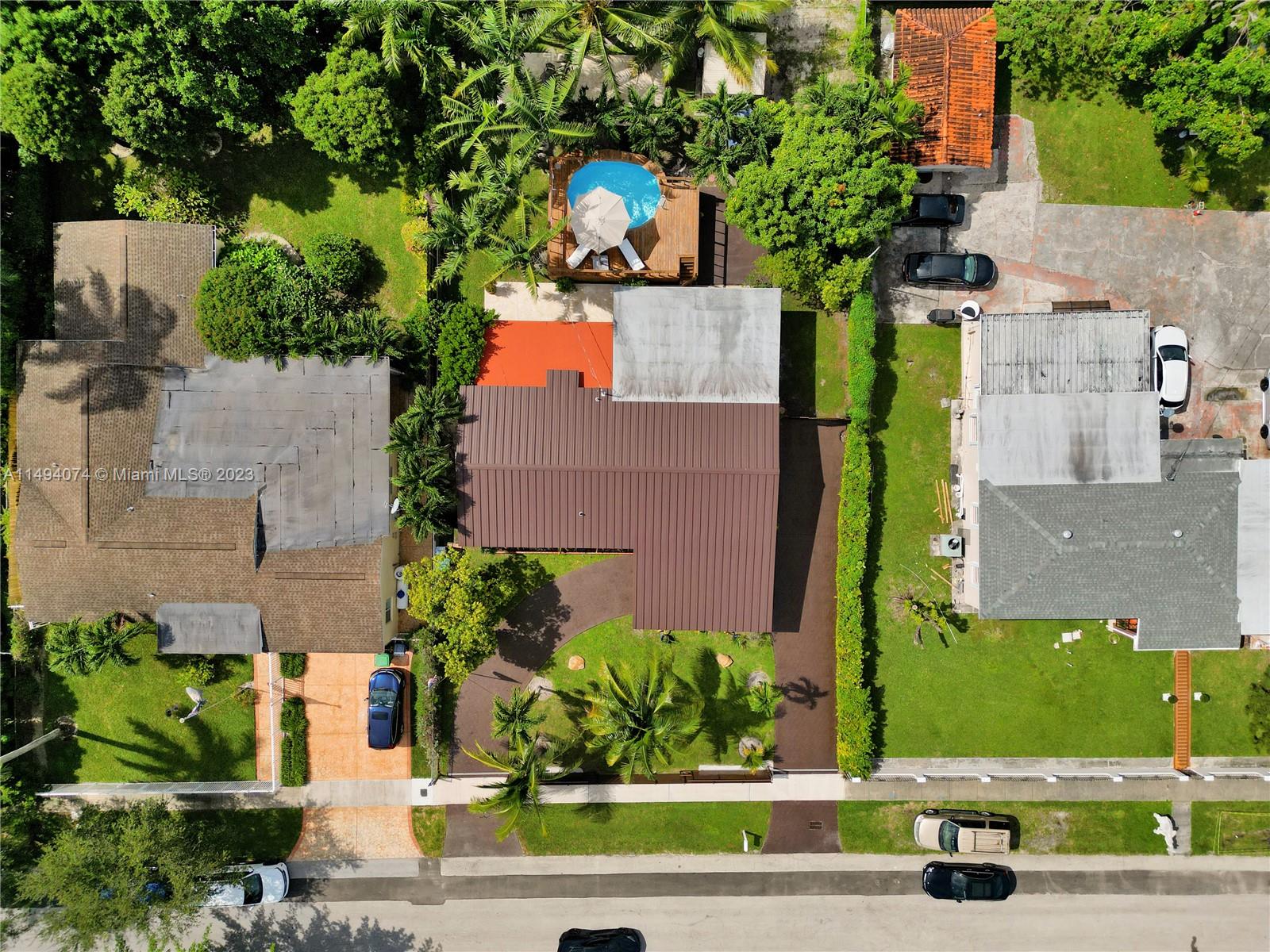 3300 Southwest 80th Avenue Miami, FL 33155 - Photo 5 of 31 an aerial view of a house with a yard and pool
