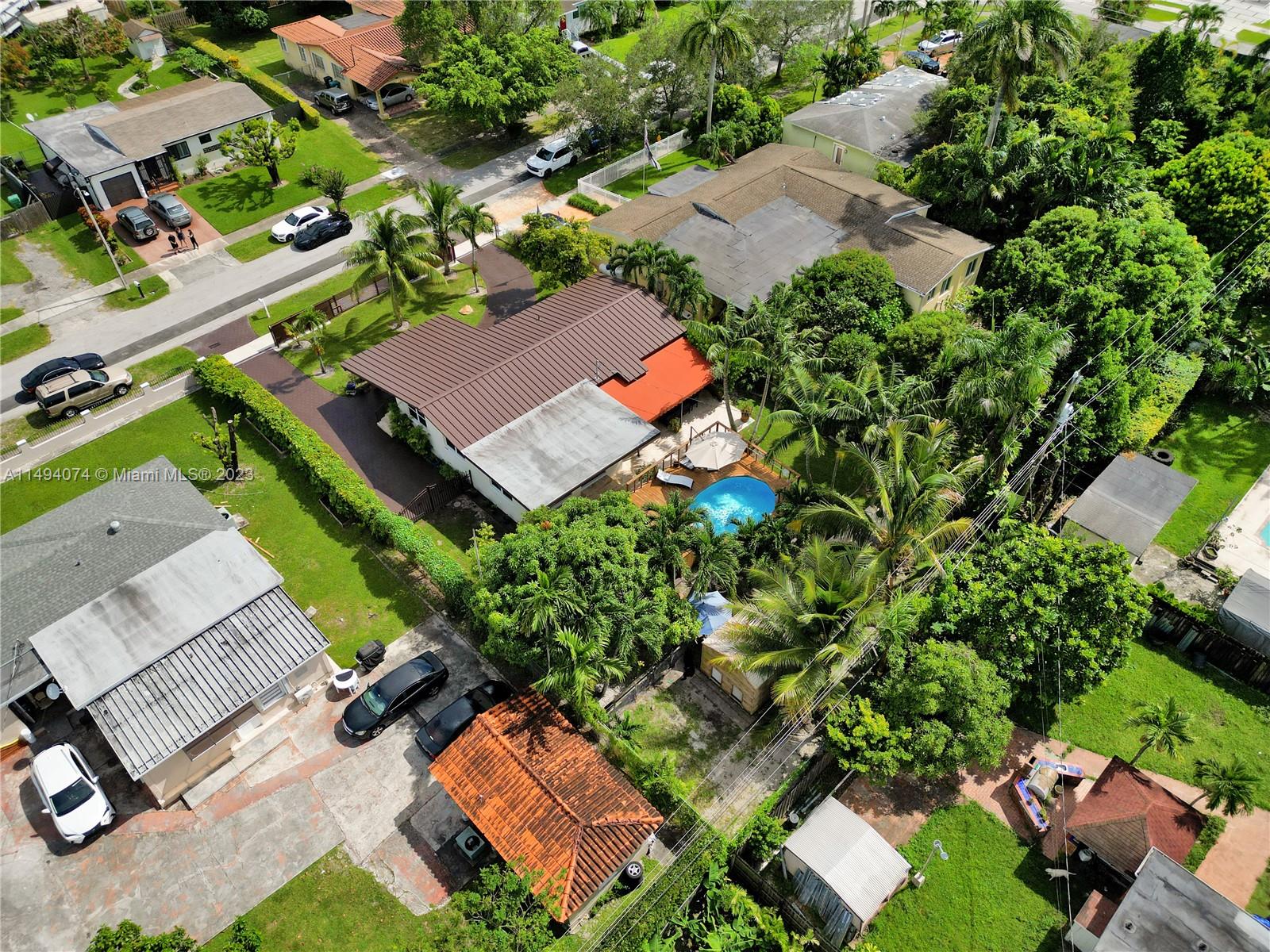 3300 Southwest 80th Avenue Miami, FL 33155 - Photo 6 of 31 an aerial view of a house with a garden