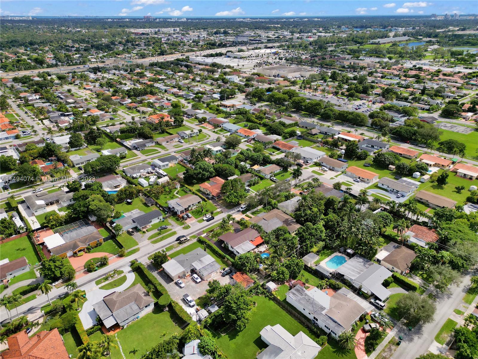 3300 Southwest 80th Avenue Miami, FL 33155 - Photo 7 of 31 an aerial view of residential houses with outdoor space