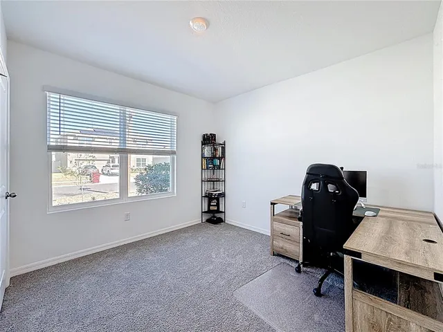 a bathroom with double sink and a mirror