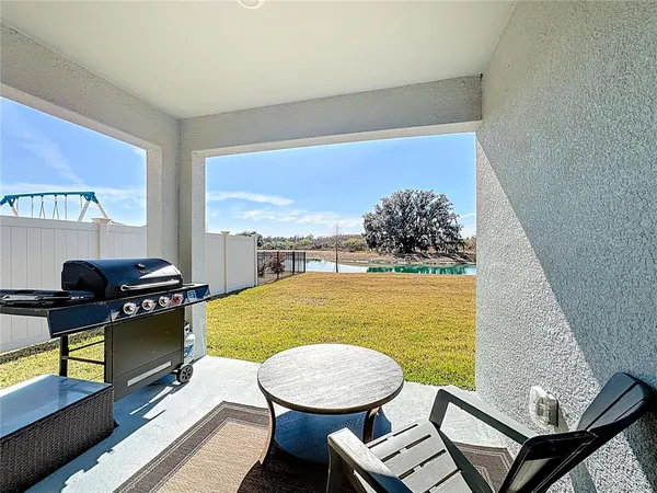 a house with trees in the background