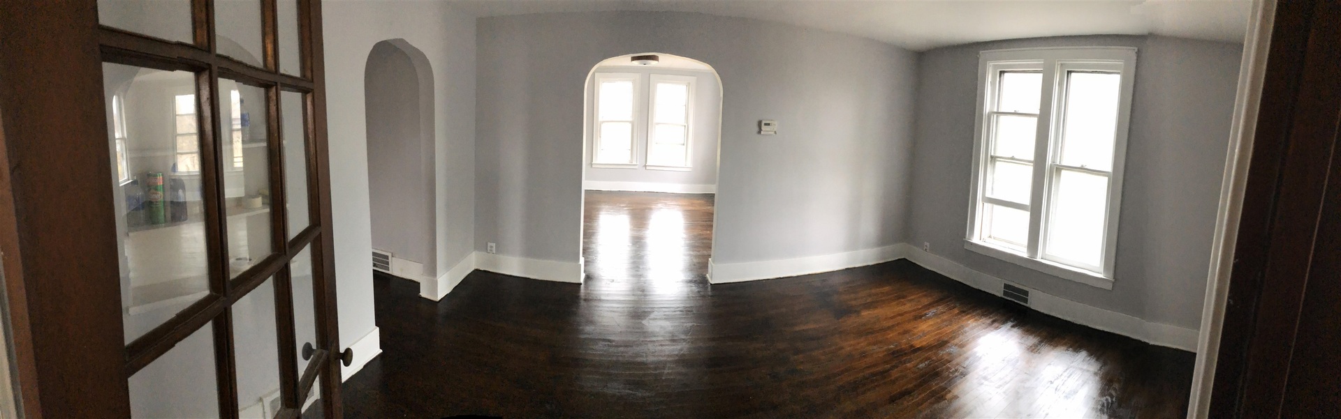 322 1st Avenue Clinton, IA 52732 - Photo 6 of 6 a view of empty room with wooden floor and fan