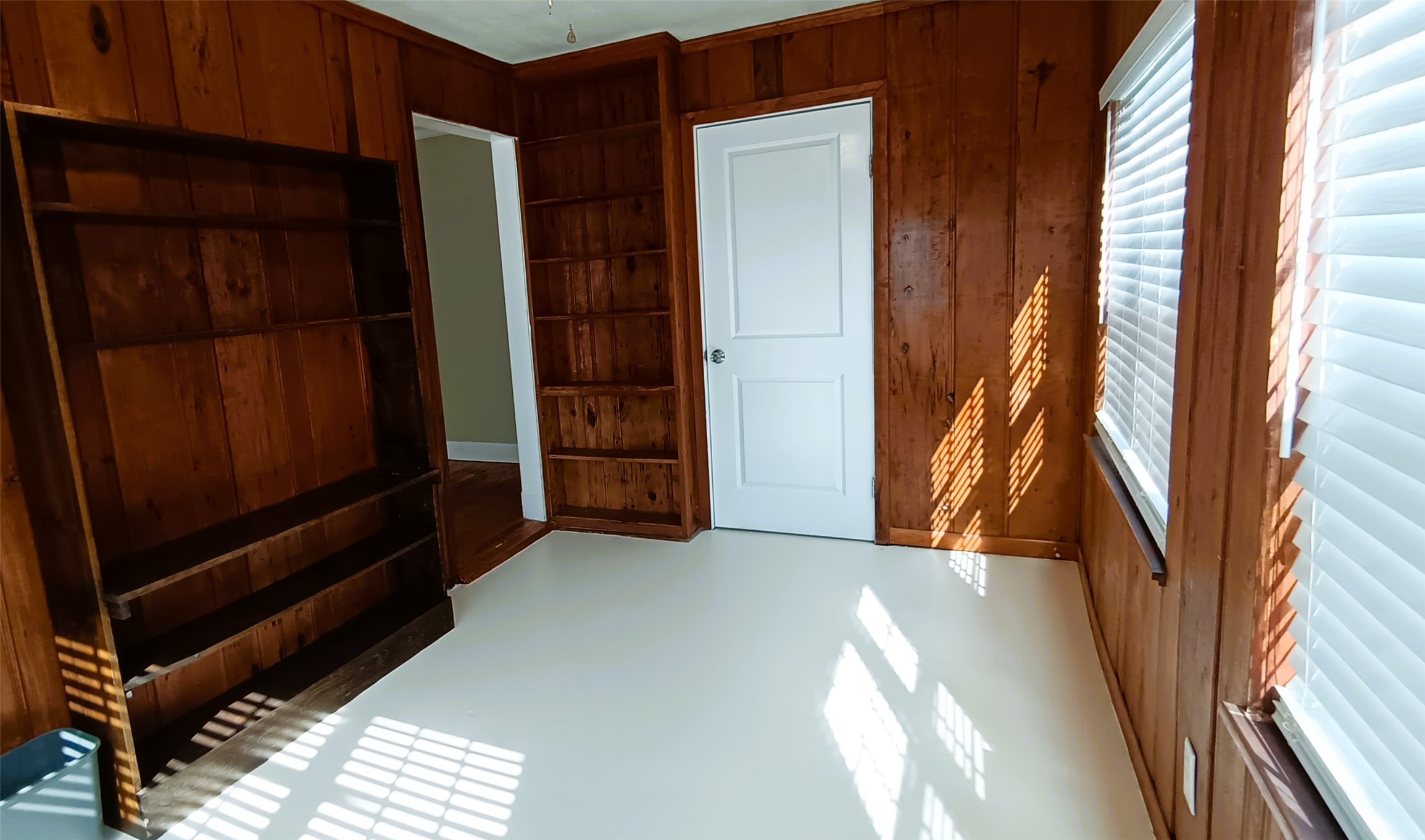 6906 Van Etten Street Houston, TX 77021 - Photo 13 of 30 Sun Room or Study/Office shelves on the left wall and far let wall