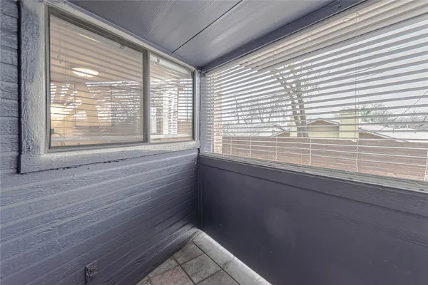 a view of a window in an empty room