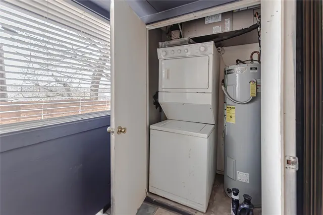 a bathroom with a shower and a window