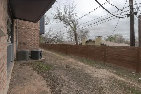 a view of a back yard of the house