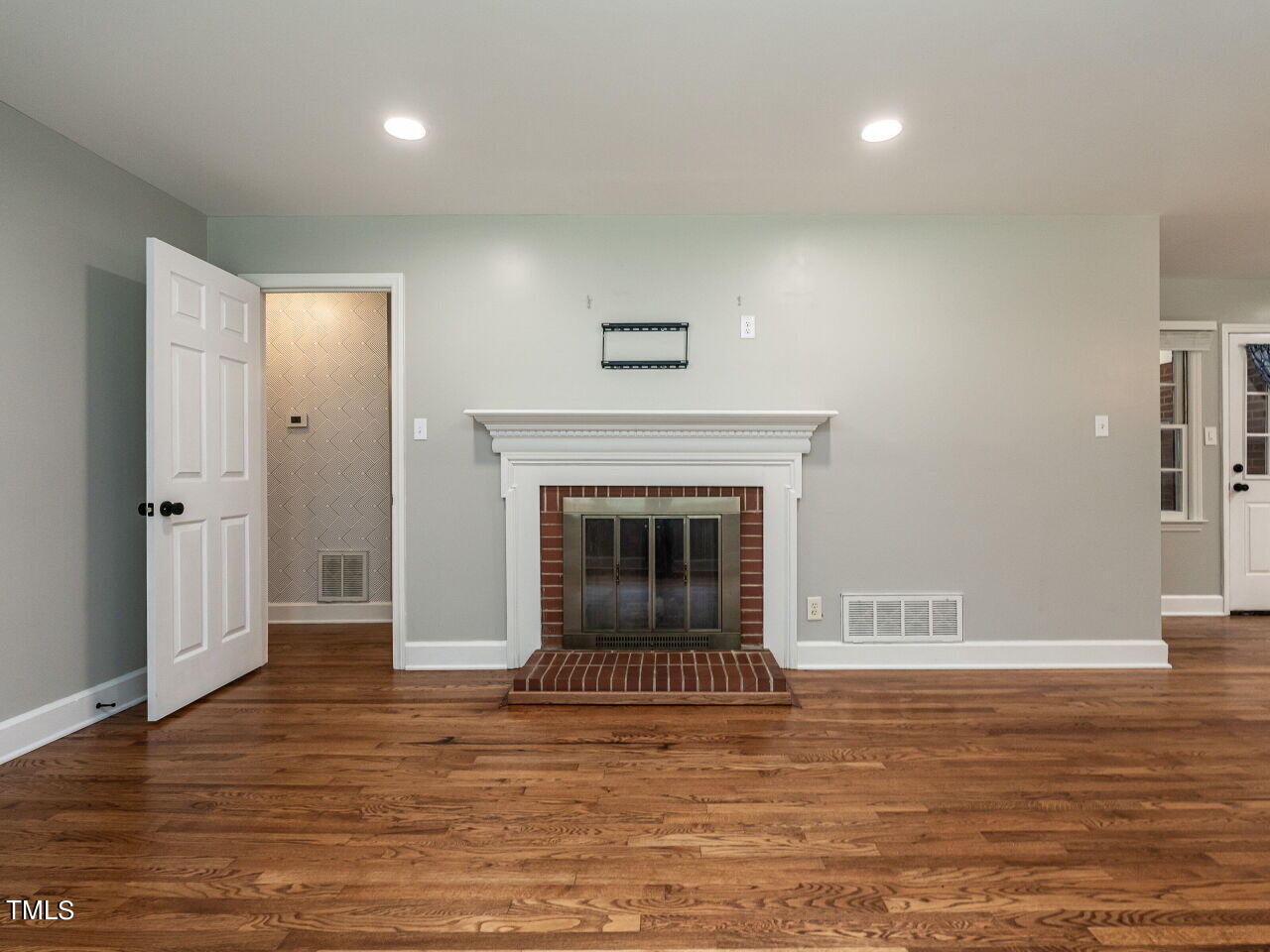 7800 White Oak Road Garner, NC 27529 - Photo 12 of 37 a view of a livingroom with a fireplace