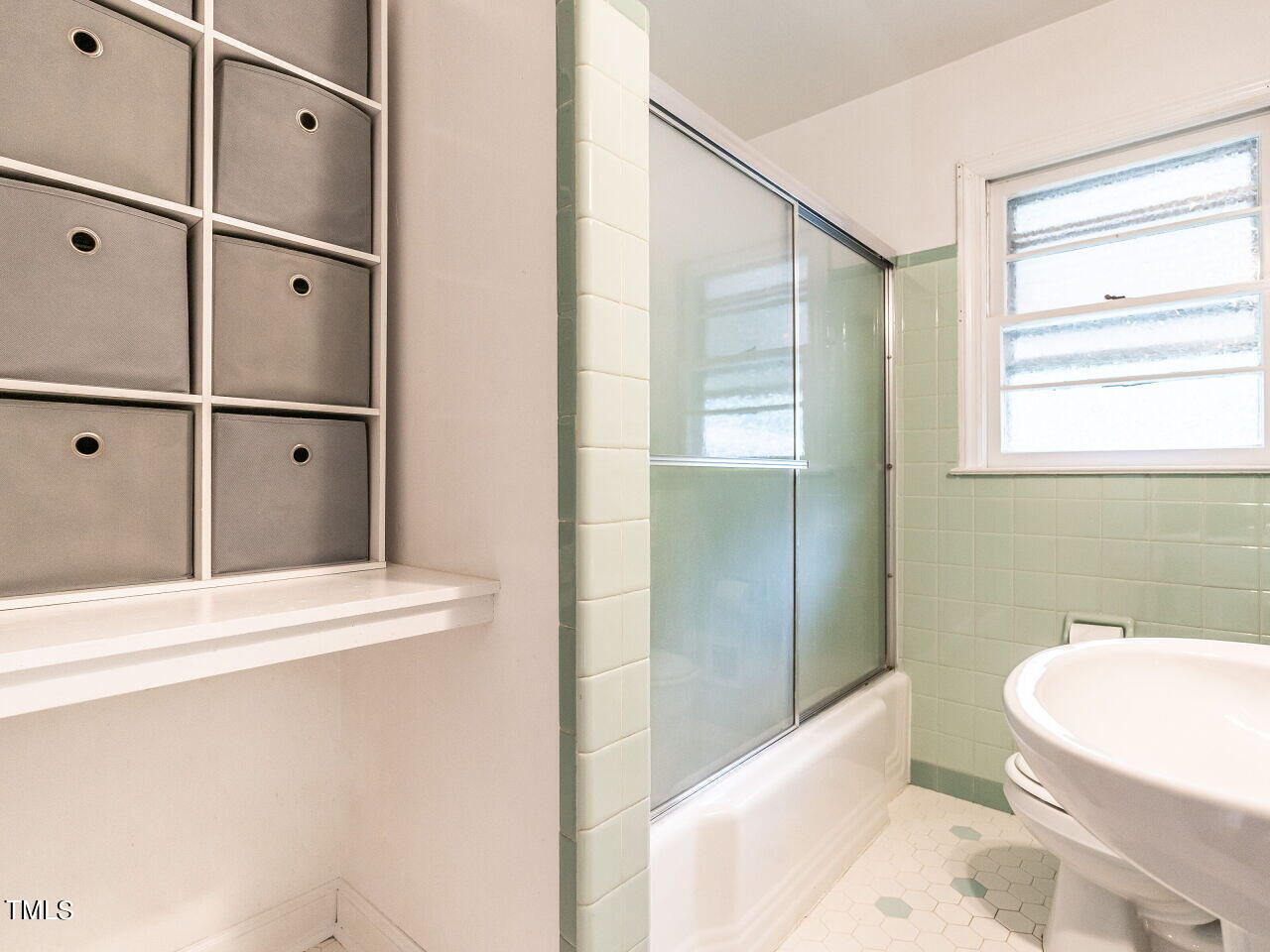 7800 White Oak Road Garner, NC 27529 - Photo 23 of 37 a bathroom with a bathtub and a shower