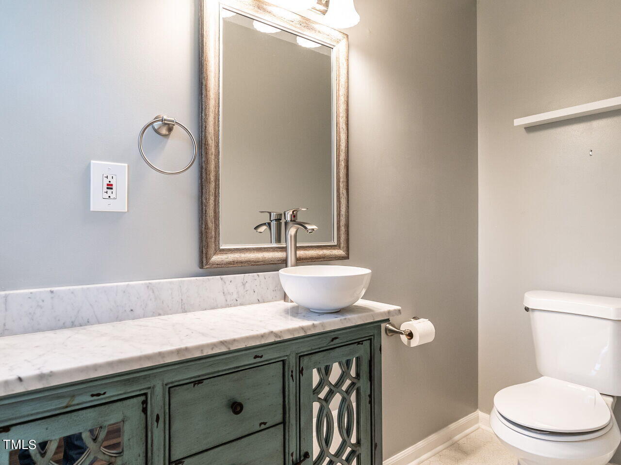 7800 White Oak Road Garner, NC 27529 - Photo 27 of 37 a bathroom with a granite countertop sink a toilet and a mirror