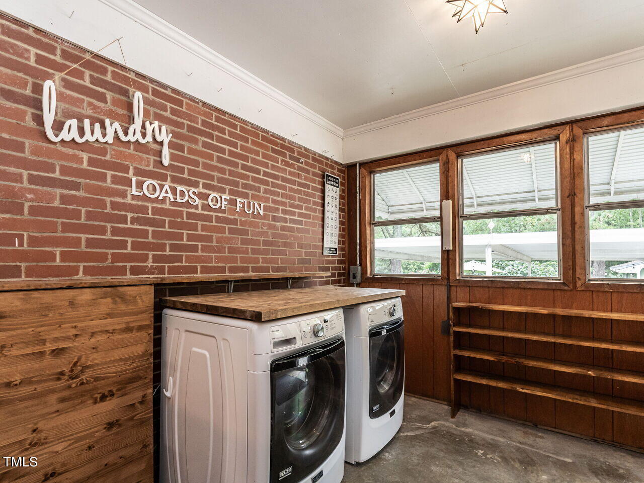 7800 White Oak Road Garner, NC 27529 - Photo 35 of 37 a utility room with dryer and washer