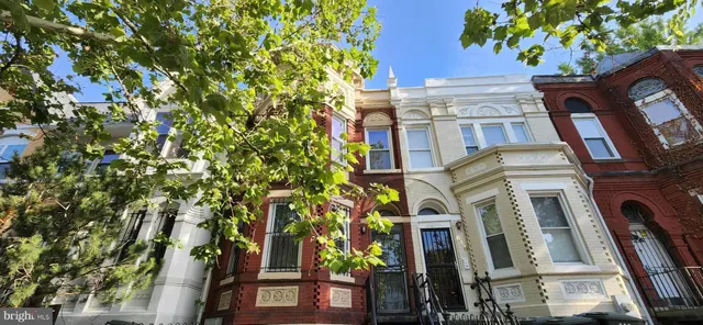 a view of a multi story residential apartment building