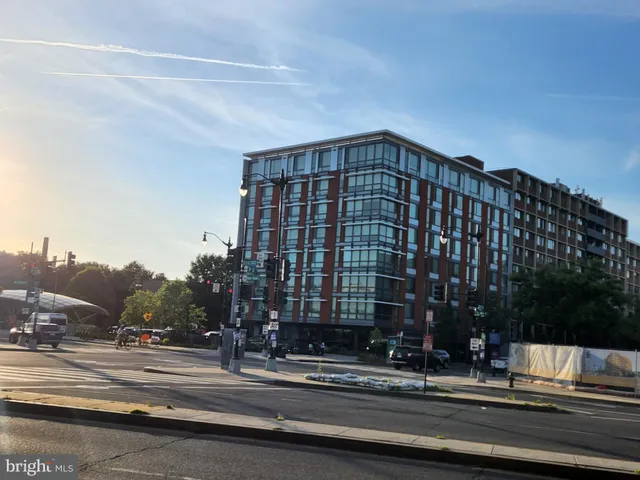 a view of a building with a street