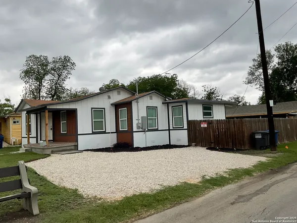 a house view with a garden space