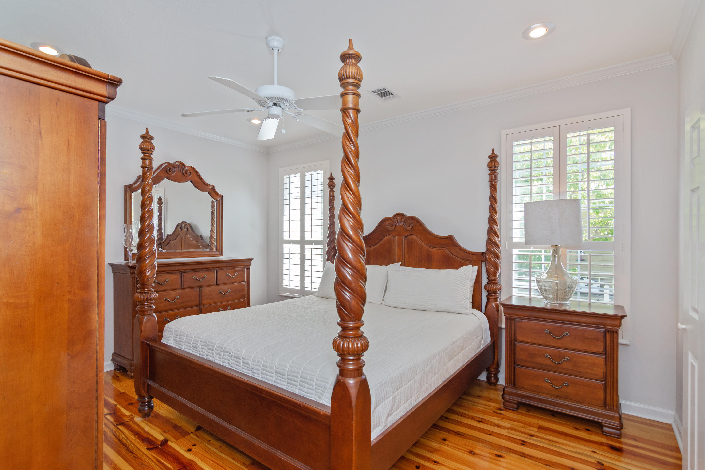 376 Seabreeze Circle Inlet Beach, FL 32461 - Photo 30 of 58 a bedroom with a bed next to a window with outer view