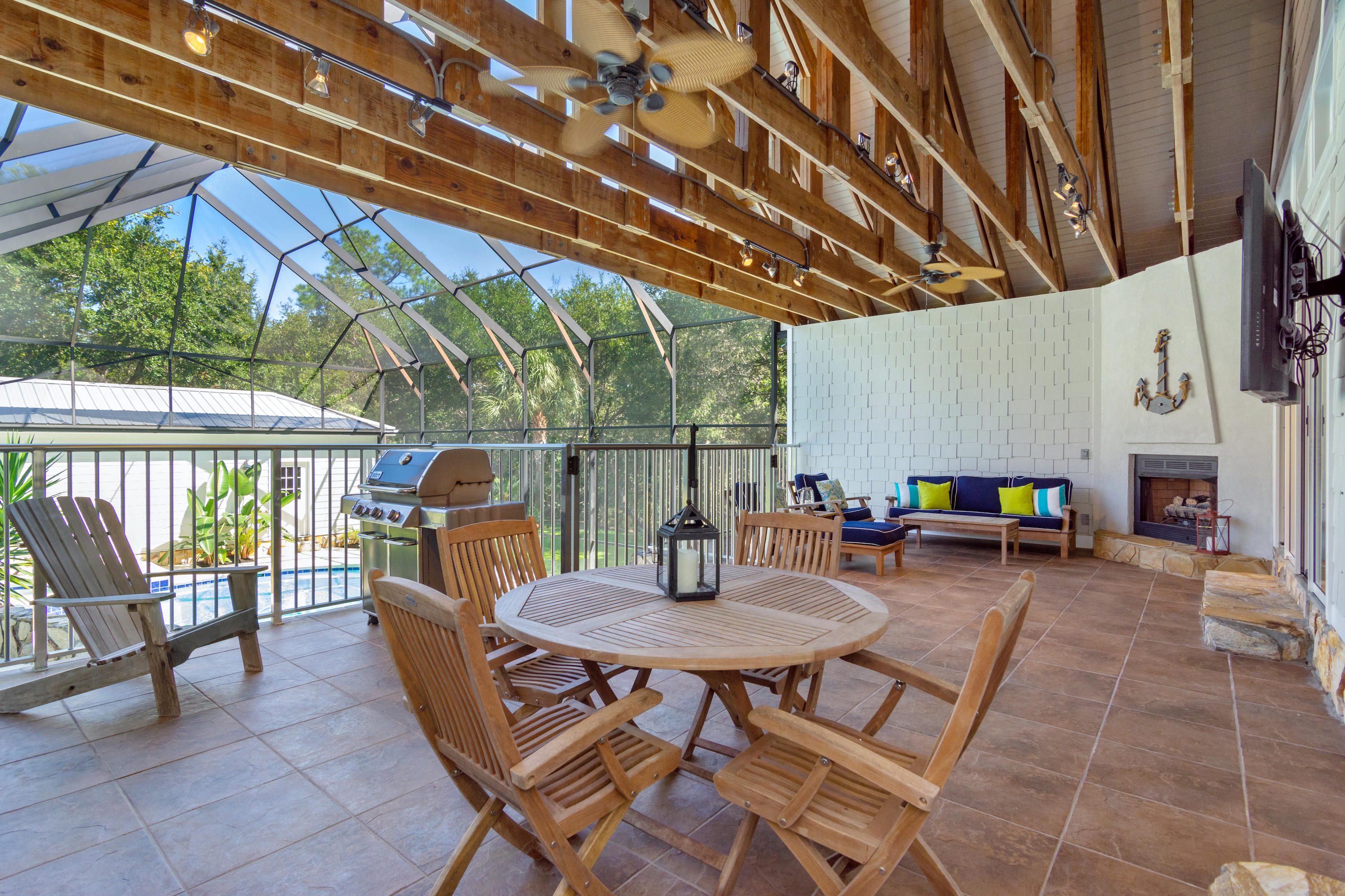 376 Seabreeze Circle Inlet Beach, FL 32461 - Photo 3 of 58 a view of a patio with a table and chairs