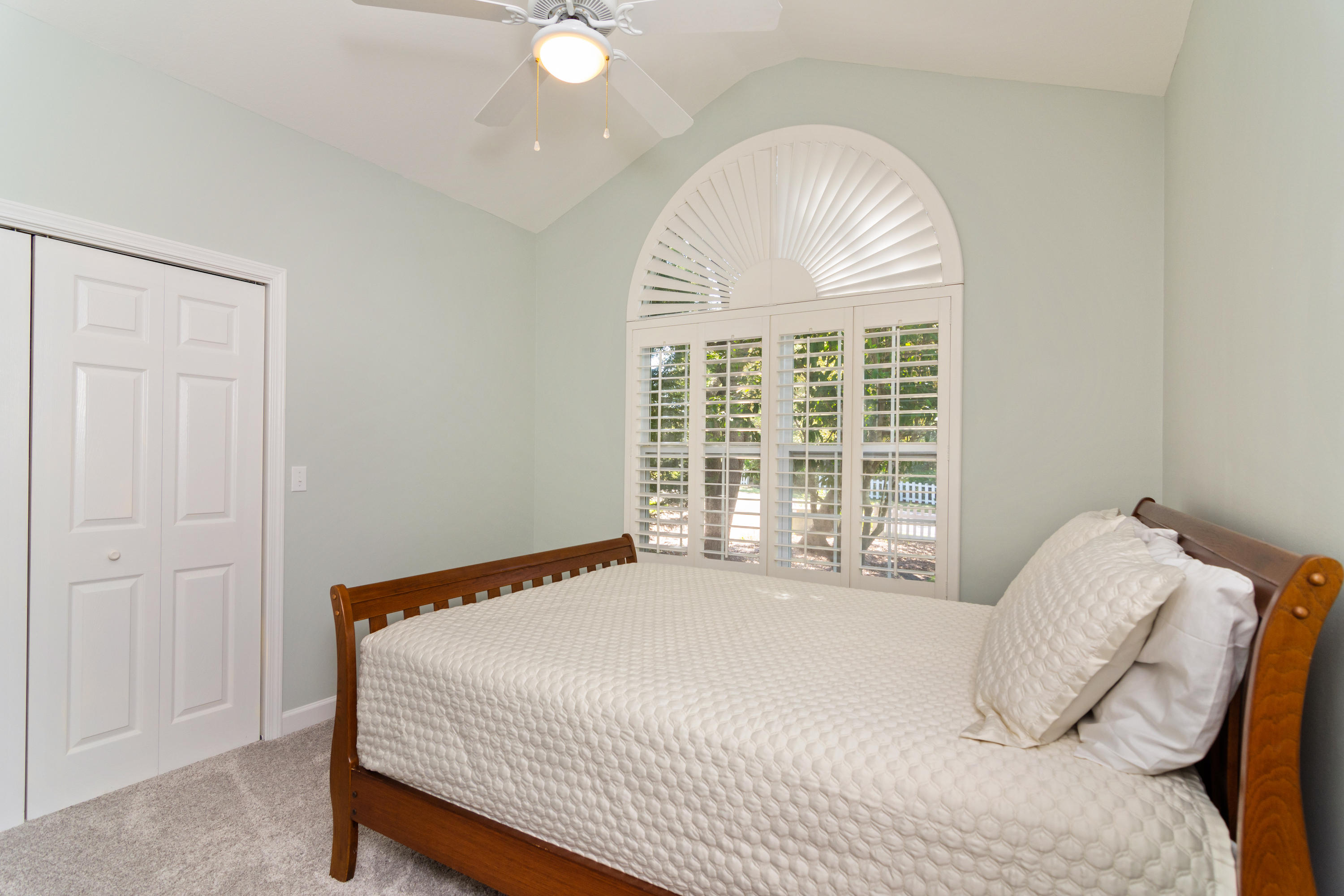 376 Seabreeze Circle Inlet Beach, FL 32461 - Photo 34 of 58 a bedroom with a bed and a large window