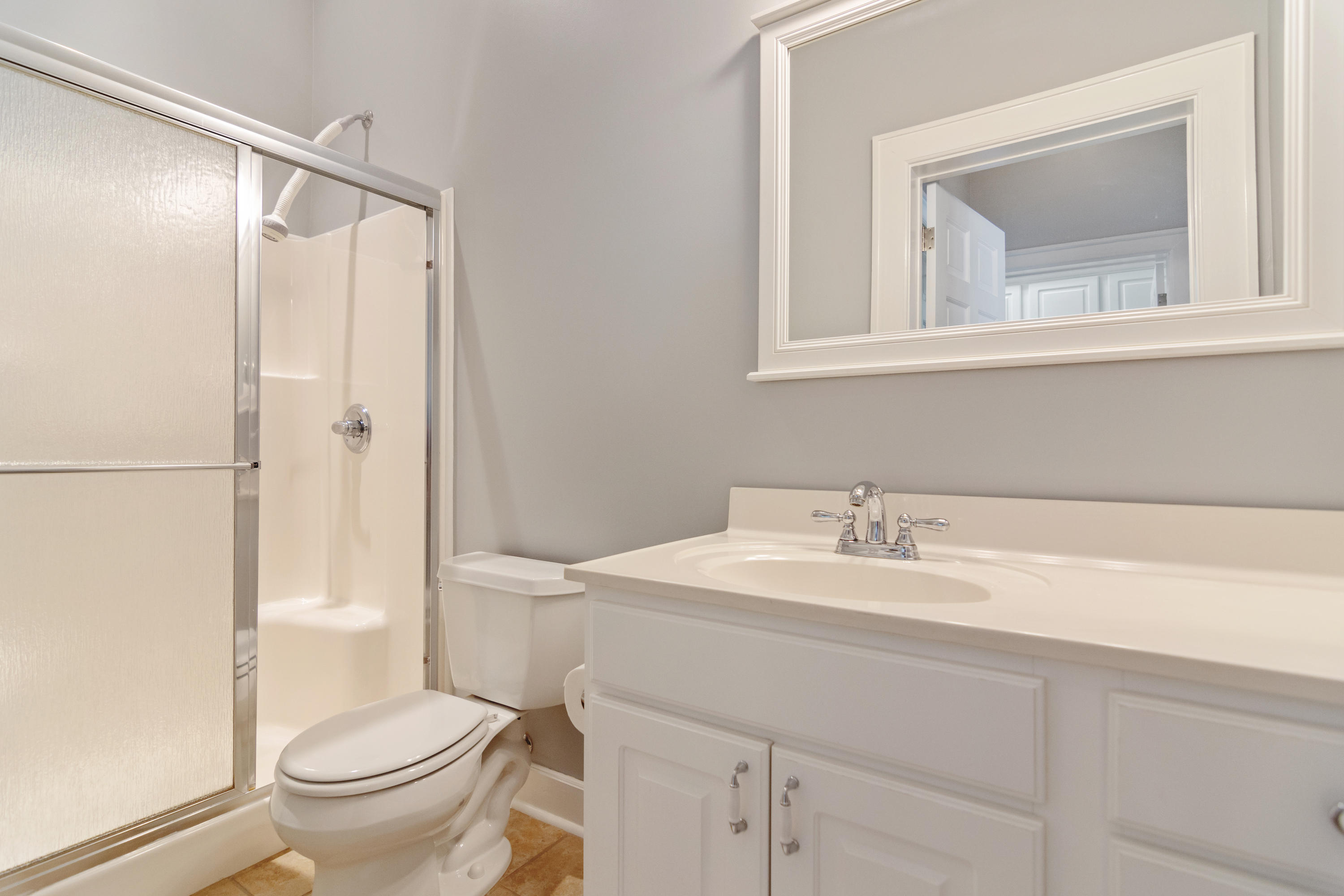 376 Seabreeze Circle Inlet Beach, FL 32461 - Photo 35 of 58 a bathroom with a sink a toilet and a mirror