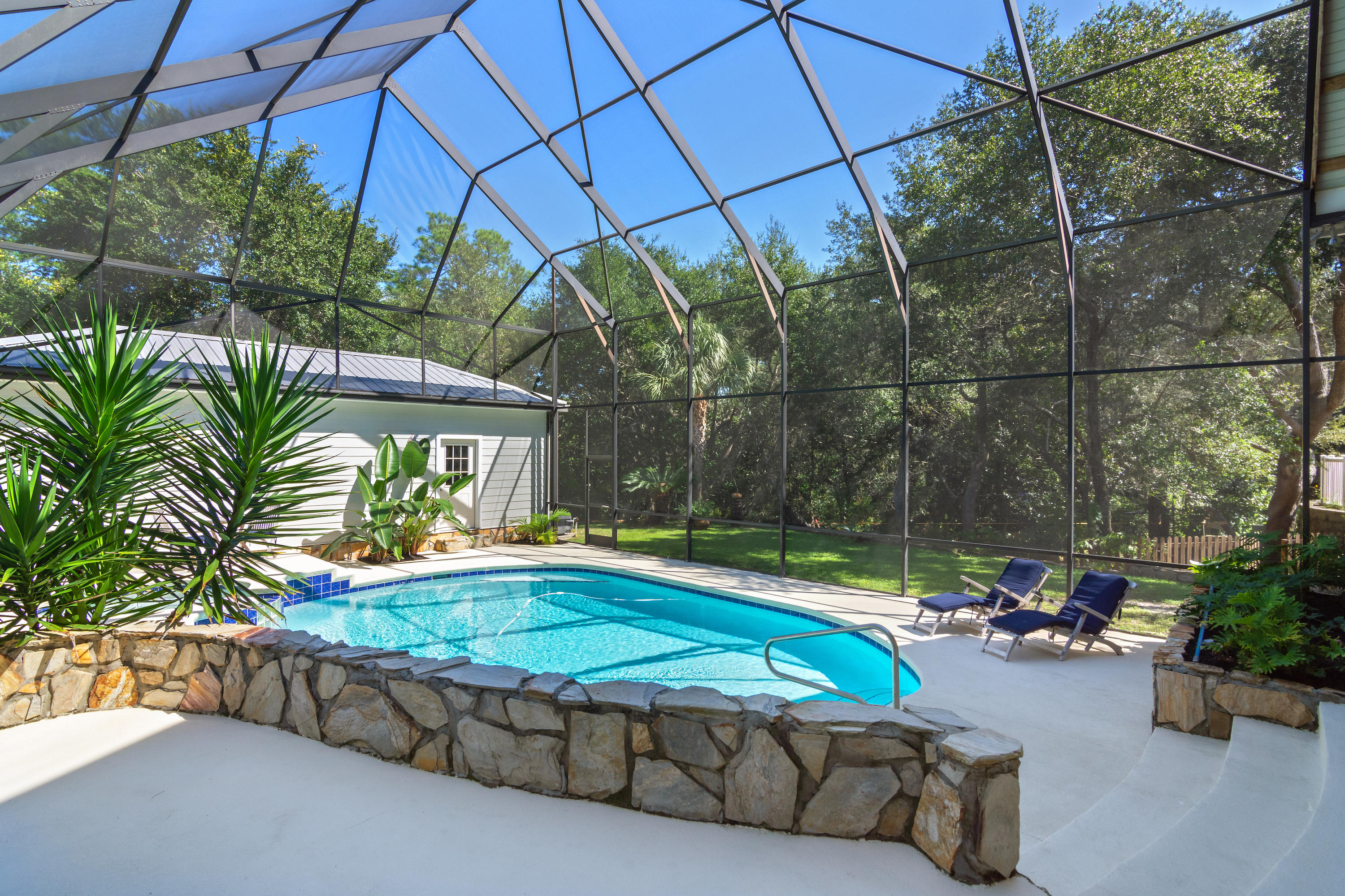 376 Seabreeze Circle Inlet Beach, FL 32461 - Photo 39 of 58 a swimming pool with outdoor seating and yard
