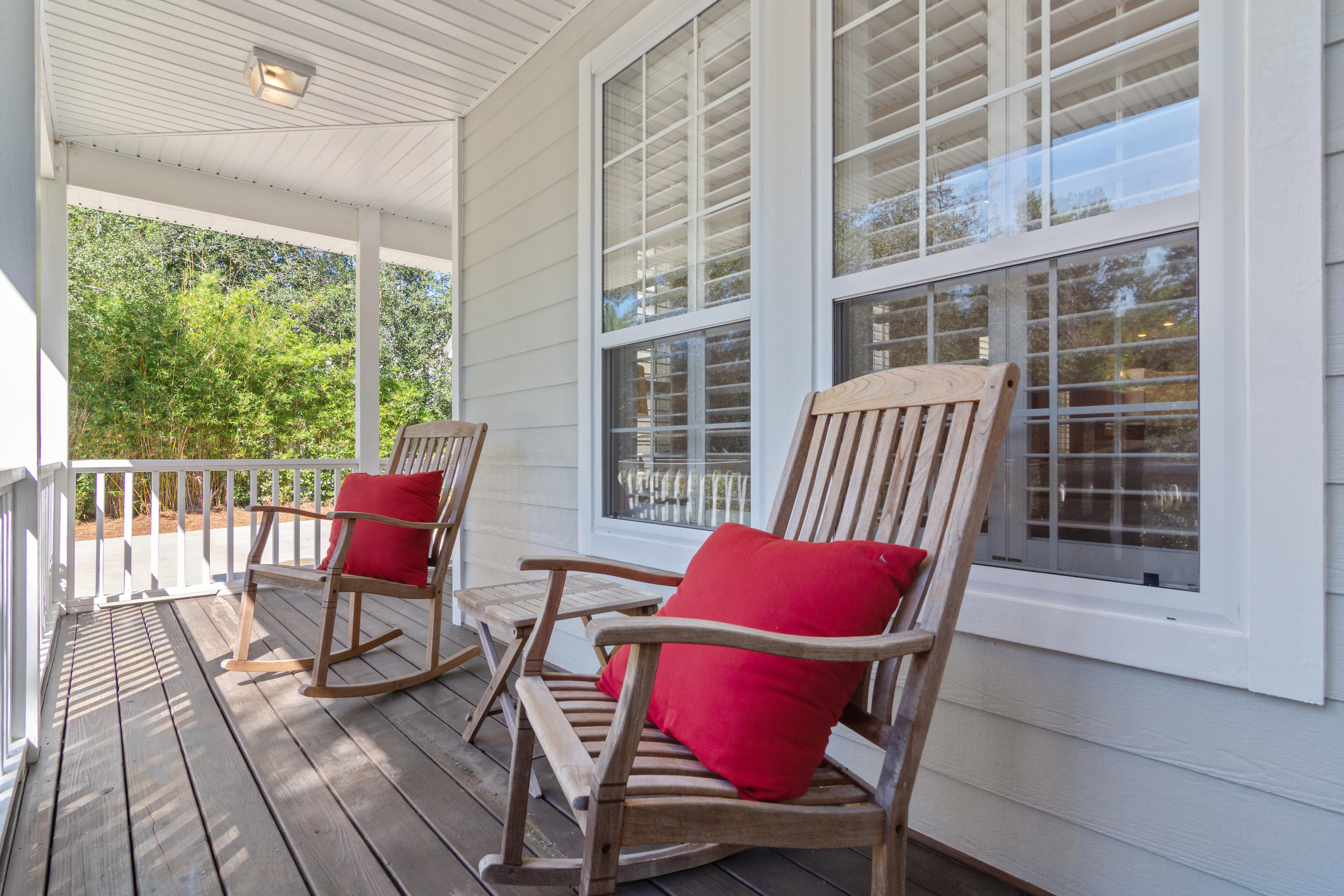 376 Seabreeze Circle Inlet Beach, FL 32461 - Photo 45 of 58 a view of a chair and table in the balcony