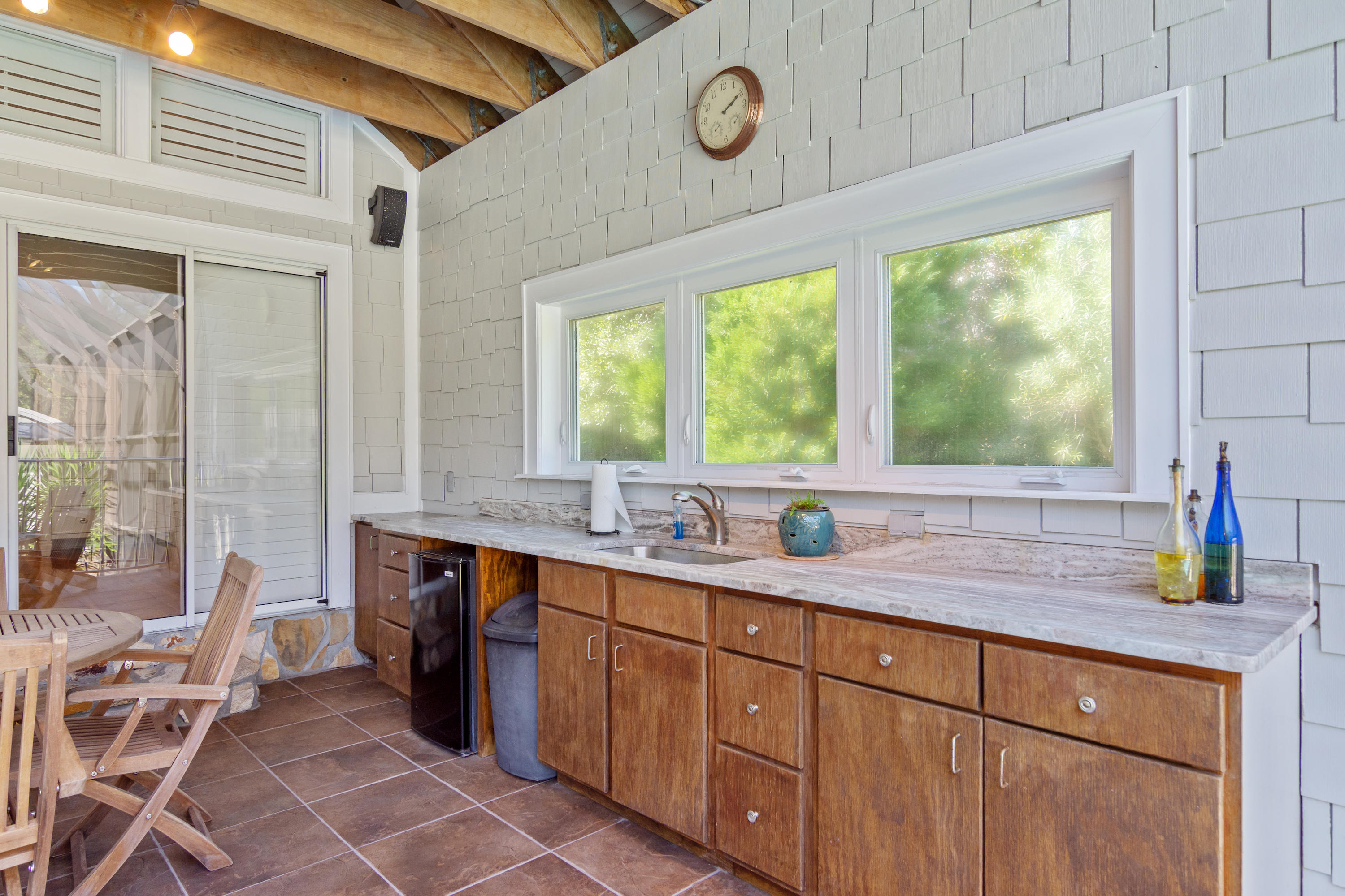 376 Seabreeze Circle Inlet Beach, FL 32461 - Photo 5 of 58 a kitchen with a sink and cabinets
