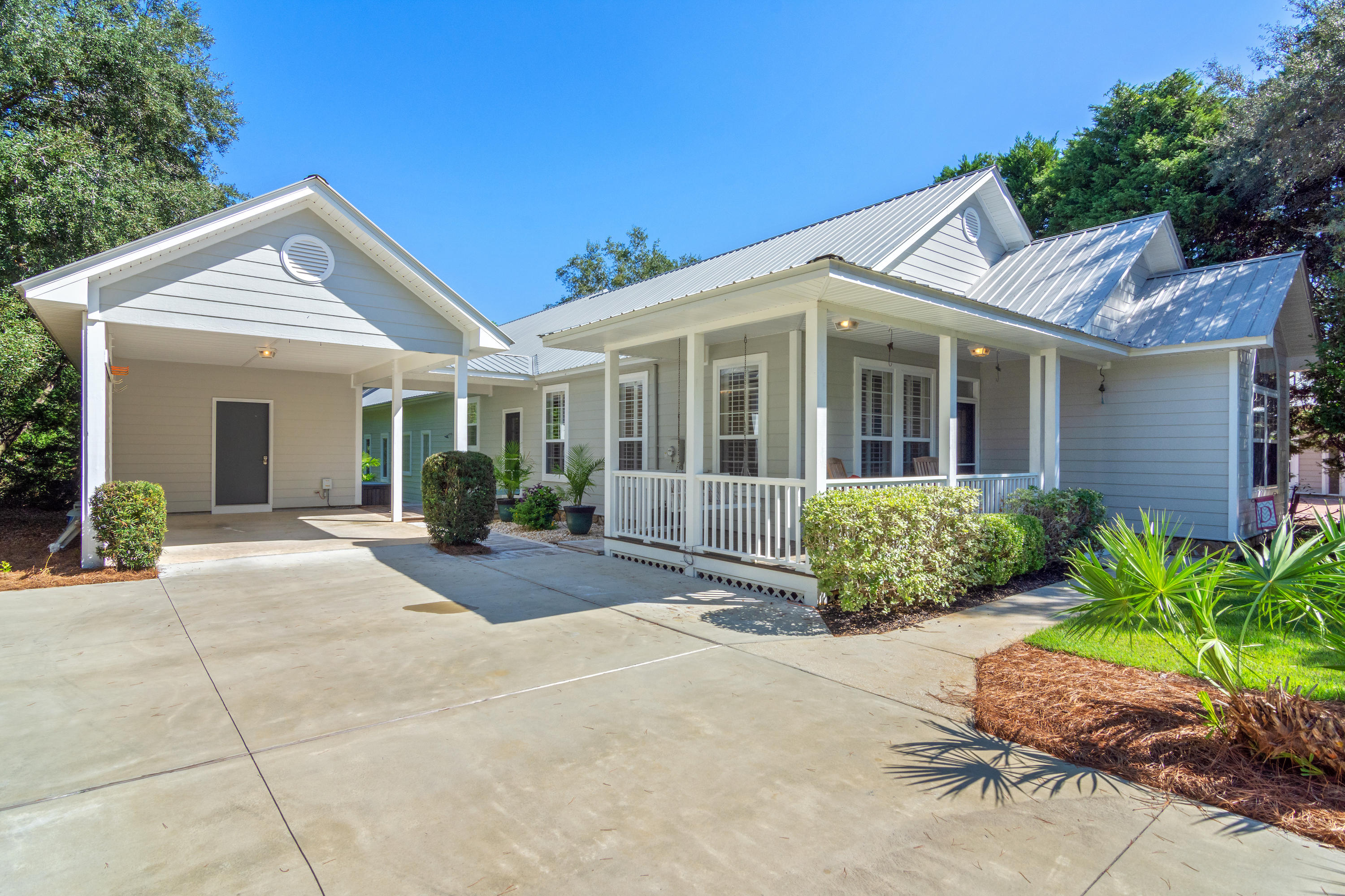 376 Seabreeze Circle Inlet Beach, FL 32461 - Photo 10 of 58 a view of a house with a patio